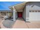 Inviting front entrance with a red door and a covered porch at 514 E Barrus Pl, Casa Grande, AZ 85122