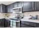Close-up of updated appliances and features in this well-equipped kitchen at 514 E Barrus Pl, Casa Grande, AZ 85122