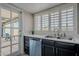 Kitchen with white countertops and an exterior door at 514 E Barrus Pl, Casa Grande, AZ 85122