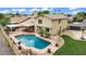 Aerial view showcasing the pool, covered patio, landscaped yard and the home's architecture at 609 W Mcnair St, Chandler, AZ 85225