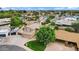 Charming home with well-kept yard, lush landscaping, and mature tree situated in a tranquil suburban community at 609 W Mcnair St, Chandler, AZ 85225