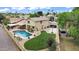 Private backyard features a sparkling pool, spacious patio, and well-maintained lawn perfect for outdoor living at 609 W Mcnair St, Chandler, AZ 85225