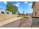 Expansive backyard featuring a basketball court, lawn, and desert landscape at 609 W Mcnair St, Chandler, AZ 85225