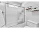 Modern bathroom with a clean, white bathtub and shower combo, featuring shelf decor at 609 W Mcnair St, Chandler, AZ 85225