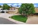 Charming two-story home with well-manicured lawn and mature shade tree providing curb appeal at 609 W Mcnair St, Chandler, AZ 85225