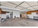 Spacious garage with ample storage cabinets and open space for parking and projects at 609 W Mcnair St, Chandler, AZ 85225