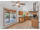 Bright kitchen with wood cabinets, stainless appliances, and tile flooring at 609 W Mcnair St, Chandler, AZ 85225