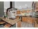 Bright, open kitchen with granite countertops and stainless steel appliances at 609 W Mcnair St, Chandler, AZ 85225
