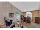 Cozy second living space with a built-in wet bar, ample seating, and natural light at 609 W Mcnair St, Chandler, AZ 85225