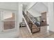 Elegant staircase with decorative railing leading to the upper level of the home at 609 W Mcnair St, Chandler, AZ 85225