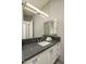 Elegant bathroom with a sleek countertop, modern fixtures, and ample lighting at 9726 E Hidden Green Dr, Scottsdale, AZ 85262