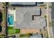 Aerial view of a private backyard with a sparkling pool and meticulously kept grounds at 9903 E Rotation Dr, Mesa, AZ 85212