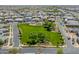 Aerial view of a Primary-planned community with lush green spaces and well-maintained streets at 9903 E Rotation Dr, Mesa, AZ 85212