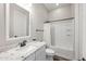 Well-appointed bathroom featuring a modern vanity, shower-tub combo, and neutral finishes at 9903 E Rotation Dr, Mesa, AZ 85212