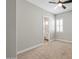 Bedroom showing an ensuite bathroom, with carpeted floors and shuttered windows at 9903 E Rotation Dr, Mesa, AZ 85212