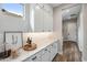Modern kitchen features white cabinets, stainless steel appliances, and stylish countertops at 9903 E Rotation Dr, Mesa, AZ 85212