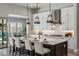Gorgeous kitchen with an island, modern appliances, and pendant lighting at 9903 E Rotation Dr, Mesa, AZ 85212
