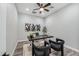 Home office with sleek desk, comfortable seating, and contemporary decor at 9903 E Rotation Dr, Mesa, AZ 85212