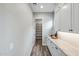 Walk-in pantry with granite countertop, modern cabinetry, and ample storage space at 9903 E Rotation Dr, Mesa, AZ 85212