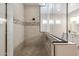 Modern glass walk-in shower featuring decorative tile accents at 9903 E Rotation Dr, Mesa, AZ 85212