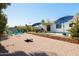 An outdoor space that is perfect for entertaining, complete with lawn games and seating at 3907 E Marilyn Rd, Phoenix, AZ 85032