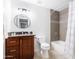 This bathroom features granite countertops, tiled shower walls, and a bathtub at 3907 E Marilyn Rd, Phoenix, AZ 85032