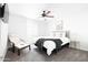 Bright bedroom features ceiling fan and accent chair at 3907 E Marilyn Rd, Phoenix, AZ 85032