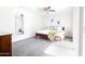 Bedroom with large mirror and plenty of natural light at 3907 E Marilyn Rd, Phoenix, AZ 85032