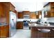 Well-equipped kitchen with stainless steel appliances and ample cabinet space at 3907 E Marilyn Rd, Phoenix, AZ 85032