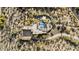 Aerial view of a luxury home featuring a private pool and desert landscaping at 8625 E Camino Vivaz --, Scottsdale, AZ 85255