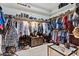 Spacious walk-in closet with ample space for clothing storage at 8625 E Camino Vivaz --, Scottsdale, AZ 85255