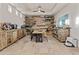 Charming dining room with rustic wood accents, built-in shelves, and natural light at 8625 E Camino Vivaz --, Scottsdale, AZ 85255