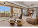 Open living space showcases a unique wood coffee table and comfortable seating, perfect for relaxation at 8625 E Camino Vivaz --, Scottsdale, AZ 85255