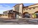 Exterior shot of Mastro's Steakhouse featuring elegant architecture and inviting entrance at 8625 E Camino Vivaz --, Scottsdale, AZ 85255