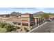 Commercial property showcasing Mastro's Steakhouse featuring manicured landscape and ample parking at 8625 E Camino Vivaz --, Scottsdale, AZ 85255