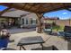 Gazebo provides shade and seating in a spacious backyard with artificial turf at 11148 E Tumbleweed Ave, Mesa, AZ 85212