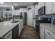 Modern kitchen featuring stainless steel appliances, a stylish backsplash, and ample counter space at 11148 E Tumbleweed Ave, Mesa, AZ 85212