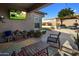 Covered patio features comfortable seating and a backyard view with outdoor gazebo at 11148 E Tumbleweed Ave, Mesa, AZ 85212