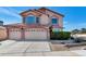 Charming two-story home featuring a three-car garage, tile roof, and well-maintained landscaping at 1313 W Glenmere Dr, Chandler, AZ 85224