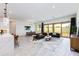 Bright living area with seamless access to the outdoors through sliding glass doors at 14429 N 75Th Dr, Peoria, AZ 85381