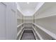 Walk-in pantry with ample shelving for organized storage at 14429 N 75Th Dr, Peoria, AZ 85381