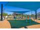 Fun playground equipment with shade cover and soft ground at 14429 N 75Th Dr, Peoria, AZ 85381