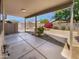 Expansive patio offers views of lush foliage and a sparkling pool for outdoor enjoyment at 1488 W Page Ave, Gilbert, AZ 85233