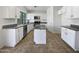 Bright kitchen with granite countertops, stainless steel appliances, and tile floors at 1488 W Page Ave, Gilbert, AZ 85233