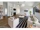 Bright living room features vaulted ceiling, fireplace, and stylish furnishings at 1488 W Page Ave, Gilbert, AZ 85233
