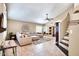 Bright living room with vaulted ceilings, a comfortable sofa, and tiled stairs at 15009 S 47Th St, Phoenix, AZ 85044