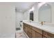 Bright bathroom featuring double sinks, ample storage and modern fixtures at 1550 N Stapley Dr # 21, Mesa, AZ 85203