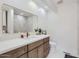 Modern bathroom featuring a large mirror and a sleek vanity at 1550 N Stapley Dr # 21, Mesa, AZ 85203