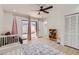Well-lit Bedroom featuring a sliding glass door to the backyard at 1550 N Stapley Dr # 21, Mesa, AZ 85203