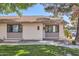 Attractive single-story house with a brick facade and manicured lawn at 1550 N Stapley Dr # 21, Mesa, AZ 85203